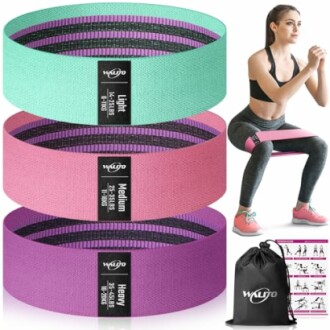 Three resistance bands in different colors with a woman exercising and a carry bag.